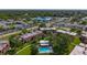 An aerial view of the community buildings, pool, and landscaping at 12900 Vonn Rd # D202, Largo, FL 33774