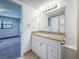 Bathroom featuring a vanity with granite countertop at 12900 Vonn Rd # D202, Largo, FL 33774