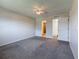 Bright bedroom with neutral walls and carpet flooring at 12900 Vonn Rd # D202, Largo, FL 33774