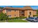 Beautiful condo building featuring private balconies, neat landscaping, and convenient parking at 12900 Vonn Rd # D202, Largo, FL 33774