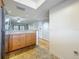Open kitchen layout featuring granite countertops and stainless steel appliances at 12900 Vonn Rd # D202, Largo, FL 33774
