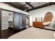 Bedroom with barn doors, hanging chair and closet at 175 S 2Nd S St # Ph-16, St Petersburg, FL 33701