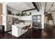 Modern kitchen with island, stainless steel appliances, and dark hardwood floors at 175 S 2Nd S St # Ph-16, St Petersburg, FL 33701