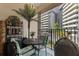 Balcony featuring a seating area, palm tree, and city views at 200 4Th S Ave # 220, St Petersburg, FL 33701