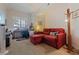 Bright bedroom featuring a cozy seating area, desk, and ample natural light at 200 4Th S Ave # 220, St Petersburg, FL 33701