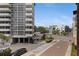 Street view of a modern apartment building with nearby parking at 200 4Th S Ave # 220, St Petersburg, FL 33701