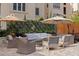 An inviting outdoor living space with comfortable seating surrounded by lush greenery at 200 4Th S Ave # 220, St Petersburg, FL 33701