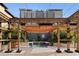 Charming courtyard featuring a small pool, pergola, and surrounding foliage at 200 4Th S Ave # 220, St Petersburg, FL 33701