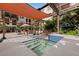 Serene courtyard with a tranquil dipping pool and shaded seating areas at 200 4Th S Ave # 220, St Petersburg, FL 33701
