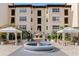 Condo courtyard with fountain and seating area at 200 4Th S Ave # 220, St Petersburg, FL 33701
