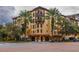 Attractive condo building featuring private balconies and lush greenery at 200 4Th S Ave # 220, St Petersburg, FL 33701