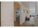 Hallway leading to a living area, showcasing an open and inviting floor plan at 200 4Th S Ave # 220, St Petersburg, FL 33701