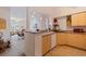 Kitchen with stainless steel appliances, tile floors, and laminate cabinets at 200 4Th S Ave # 220, St Petersburg, FL 33701