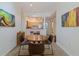 Cozy living room with kitchen view and laminate cabinets at 200 4Th S Ave # 220, St Petersburg, FL 33701