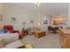 Inviting living room with comfortable seating, artful decor, and an open floor plan at 200 4Th S Ave # 220, St Petersburg, FL 33701