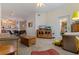 Open-concept living room with a kitchen view, modern furniture, and stylish decor at 200 4Th S Ave # 220, St Petersburg, FL 33701
