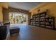 Welcoming lounge area featuring comfortable seating, a large bookcase, and access to a pool area at 200 4Th S Ave # 220, St Petersburg, FL 33701