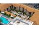 A stunning aerial view of a community pool area with lounge chairs and meticulously kept grounds at 200 4Th S Ave # 220, St Petersburg, FL 33701