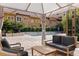 Inviting pool area with comfortable lounge seating surrounded by lush landscaping at 200 4Th S Ave # 220, St Petersburg, FL 33701