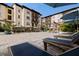 Relaxing pool area with lounge chairs, umbrellas, and landscaped surroundings at 200 4Th S Ave # 220, St Petersburg, FL 33701