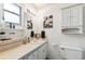 Bright bathroom boasts a vanity, ample storage, and a well-lit mirror at 2013 Capri Rd, Valrico, FL 33594