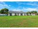 Charming single-story home with spacious front yard and manicured lawn at 2013 Capri Rd, Valrico, FL 33594