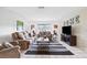 Comfortable living room with a large window for natural light and plush seating for relaxation at 2013 Capri Rd, Valrico, FL 33594