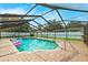Enjoy this screened pool with brick pavers, calming water, and room for fun floats! at 2013 Capri Rd, Valrico, FL 33594