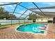 Inviting screened pool with a brick patio, perfect for enjoying outdoor relaxation and recreation at 2013 Capri Rd, Valrico, FL 33594