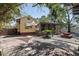 Charming backyard with a screened porch, paved patio, and mature landscaping providing a private outdoor space at 202 39Th S Ave, St Petersburg, FL 33705
