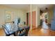 Dining room open to kitchen with access to outdoor views at 202 39Th S Ave, St Petersburg, FL 33705