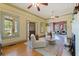 Bright living room with hardwood floors, stylish furniture, and seamless transition to the next room at 202 39Th S Ave, St Petersburg, FL 33705
