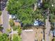 Aerial view of the property showcasing the house and the surrounding landscaping and nearby street at 2230 Melrose S Ave, St Petersburg, FL 33712