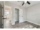 Bedroom features spacious closet and neutral paint and wood look floors at 2230 Melrose S Ave, St Petersburg, FL 33712