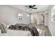 Bedroom with attached bath boasts wood-look floors and recessed lighting at 2230 Melrose S Ave, St Petersburg, FL 33712