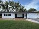 Charming single-story home with a well-maintained lawn and a freshly painted exterior in a quiet neighborhood at 2254 66Th S Ave, St Petersburg, FL 33712