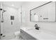 Bathroom featuring a glass enclosed shower, a vanity with a mirror, and neutral tones at 226 Willowick Ave, Temple Terrace, FL 33617