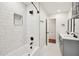 Bright bathroom features updated shower, double sinks and updated countertops at 226 Willowick Ave, Temple Terrace, FL 33617