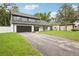 Attractive two-story home with a long driveway and a well-maintained front yard at 226 Willowick Ave, Temple Terrace, FL 33617