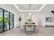 Bright dining room featuring a sleek table setting and contemporary decor at 2902 S Beach Dr, Tampa, FL 33629