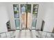 Staircase view with modern chandelier and staircase at 2902 S Beach Dr, Tampa, FL 33629