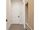 Hallway featuring modern style design with a storage bench and lots of space at 2902 S Beach Dr, Tampa, FL 33629