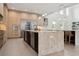 Gourmet kitchen features a large island, stainless steel appliances, and an open floor plan at 2902 S Beach Dr, Tampa, FL 33629