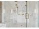 The luxurious marble steam shower with double shower heads and custom lighting offers a spa-like experience at 2902 S Beach Dr, Tampa, FL 33629