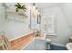 Stylish bathroom features eye-catching tile accents, natural light, and charming fixtures for a refreshing atmosphere at 301 81St Ne Ave, St Petersburg, FL 33702