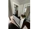 A hallway overlooks both the upstairs bathroom and bedroom at 301 81St Ne Ave, St Petersburg, FL 33702