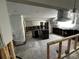 Spacious kitchen area with exposed walls, prepped and ready for finishing touches and new design at 301 81St Ne Ave, St Petersburg, FL 33702