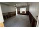 Bright living room featuring exposed walls and floors and a window seat, ready for renovation at 301 81St Ne Ave, St Petersburg, FL 33702