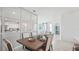 Open concept dining room with view of the living room and kitchen, great for entertaining at 31450 Paper Birch St, Wesley Chapel, FL 33545