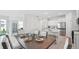 Beautiful open-concept dining area is adjacent to the modern kitchen, great for entertaining and Gathering gatherings at 31458 Paper Birch St, Wesley Chapel, FL 33545